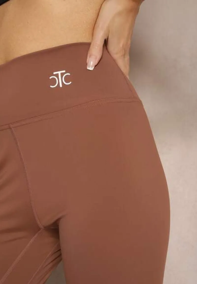 Brązowe Sportowe Legginsy High Waist z Małym Ozdobnym Znaczkiem Lerilane