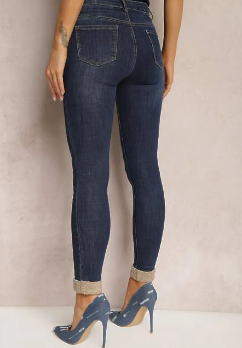 Granatowe Skinny Jeansy ze Sztucznym Futerkiem przy Kostkach Pelle
