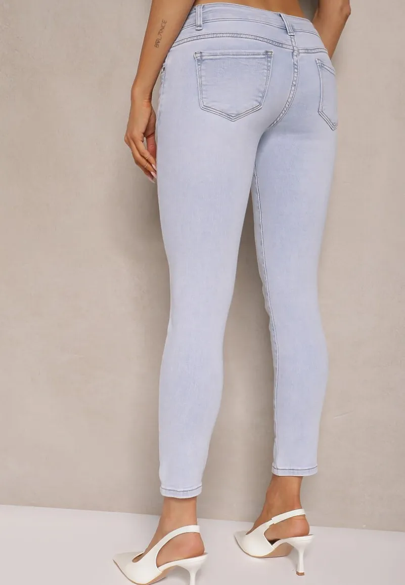 Jasnoniebieskie Jeansy o Kroju Skinny Low Waist Kolanilia
